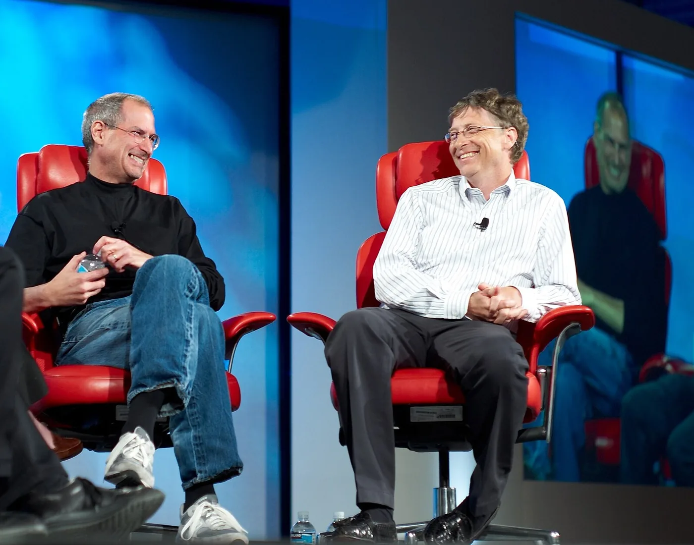 Bill Gates and Steve Jobs laughing on stage together at the D5 conference in Carlsbad, California, May 2007