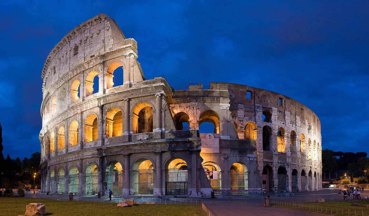 The Colosseum in Rome at dusk, the most recognisable building in Italy
