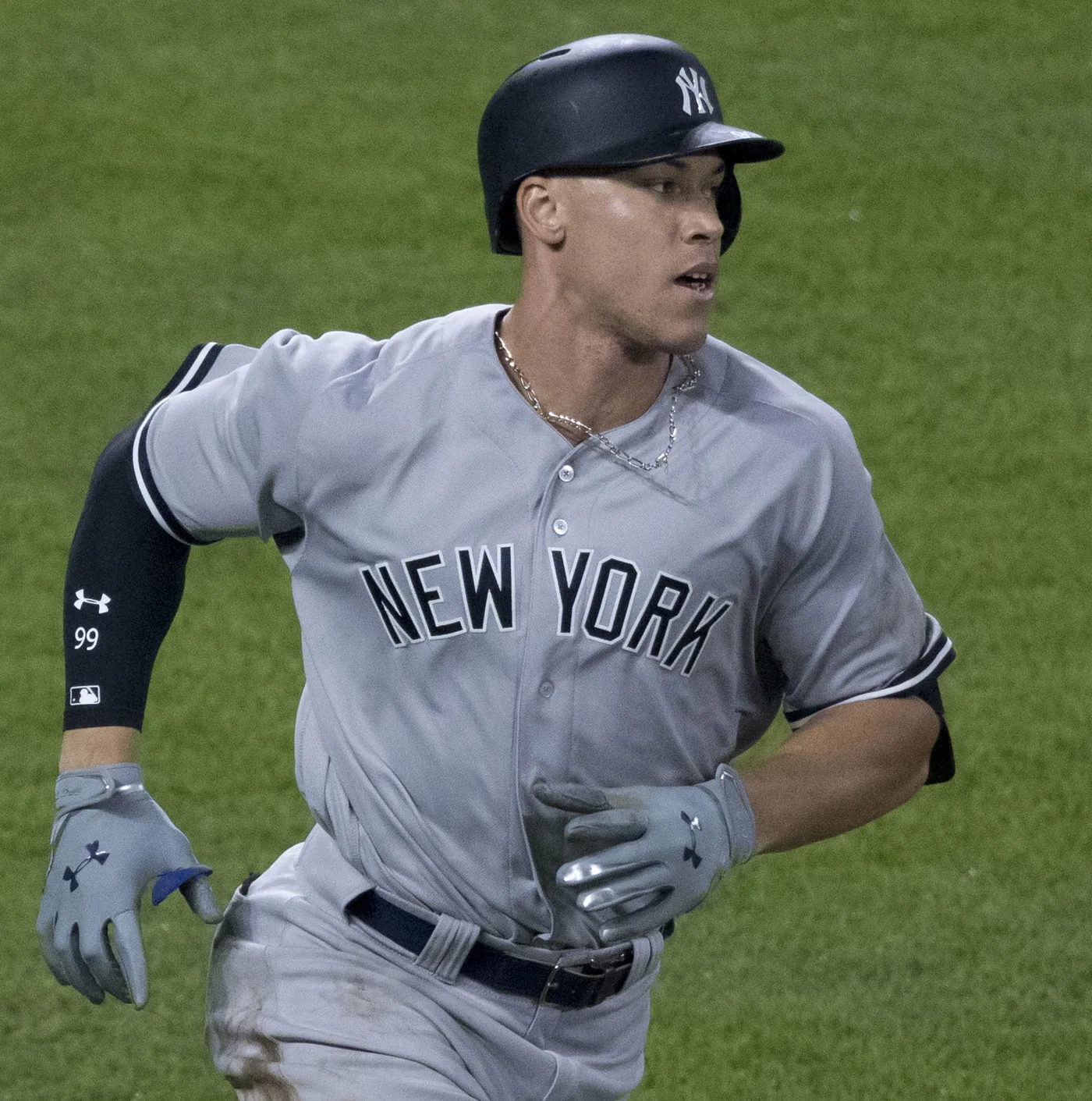 Aaron Judge of the New York Yankees running the bases in the team's grey road uniform