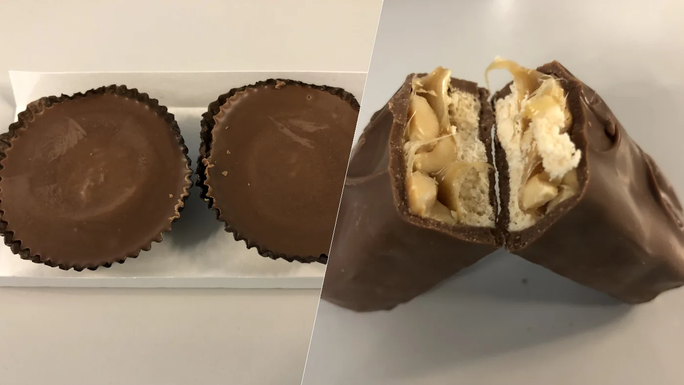 Two Reese's Peanut Butter Cups beside a Snickers bar broken in half