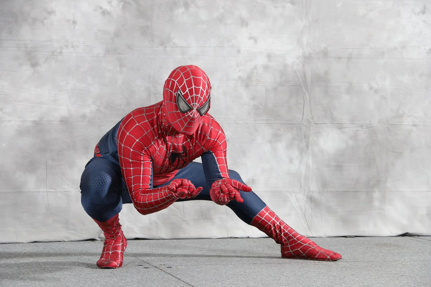 A Spider-Man costume in the character's crouched perch pose