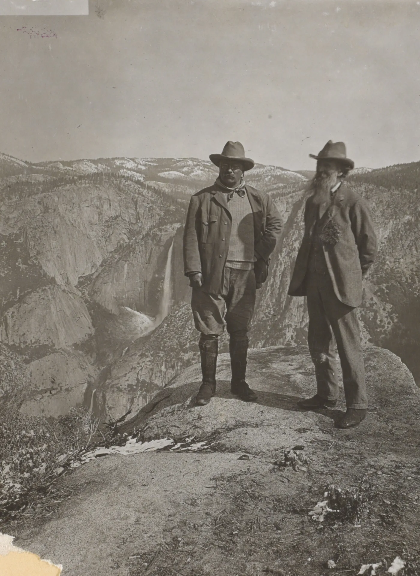 Theodore Roosevelt and John Muir standing on Glacier Point above Yosemite Valley in 1903