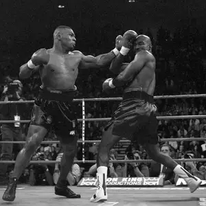 Evander Holyfield beats Mike Tyson — ranked #7
