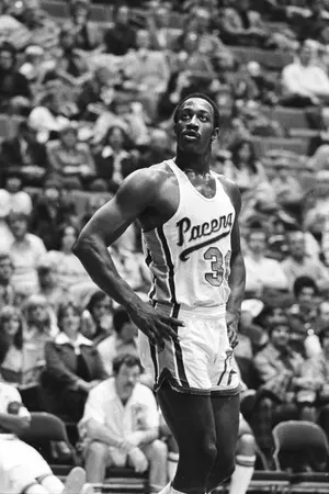 George McGinnis — ranked #16