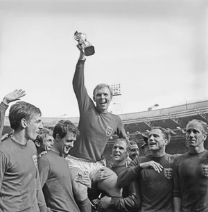 Bobby Moore Lifts the Trophy — ranked #12