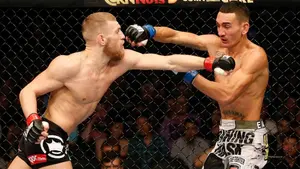 vs. Max Holloway (2013) — ranked #11