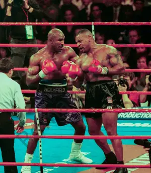 Evander Holyfield vs Mike Tyson — ranked #9