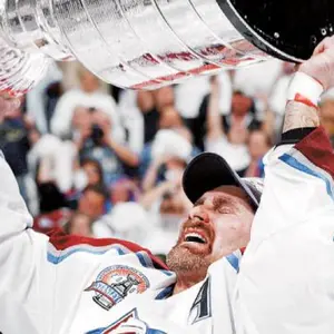 Ray Bourque Lifts the Cup (2001) — ranked #4